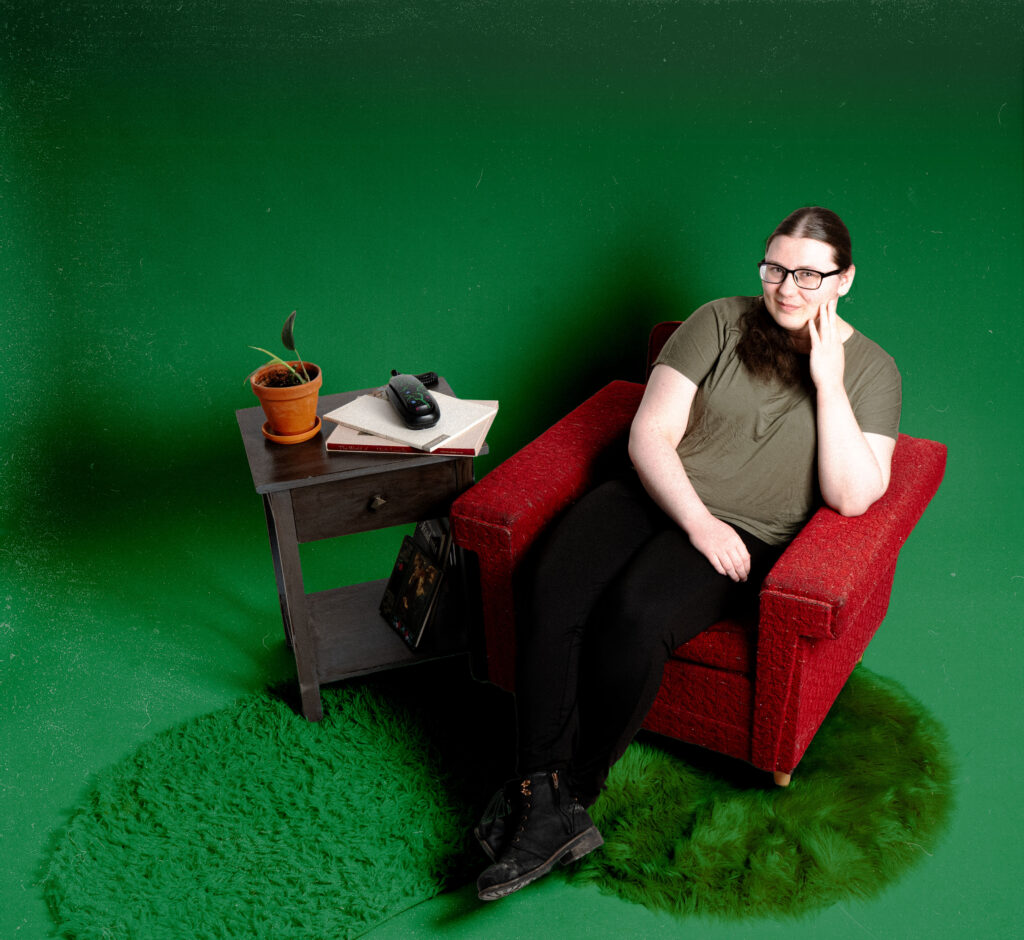 Girl with brown hair on green background