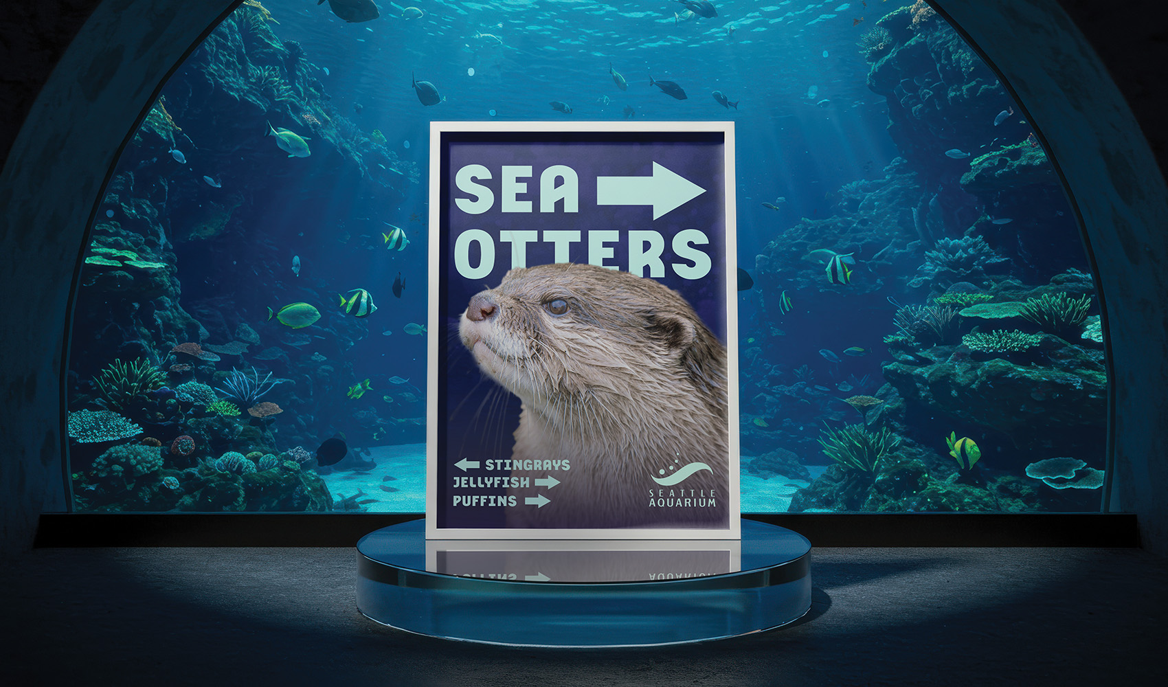 Aquarium way-finding sign with a sea otter and Maritimum typeface